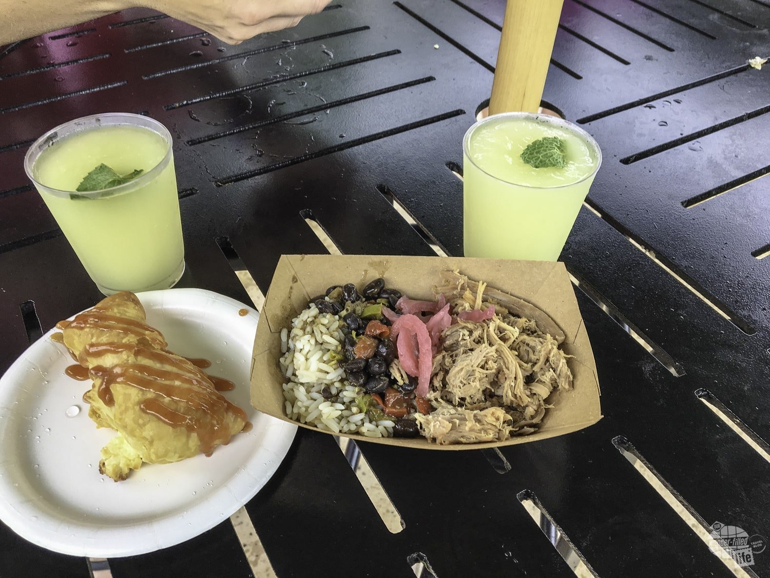 Dishes from the Islands of the Caribbean kiosk at the Food & Wine Festival.