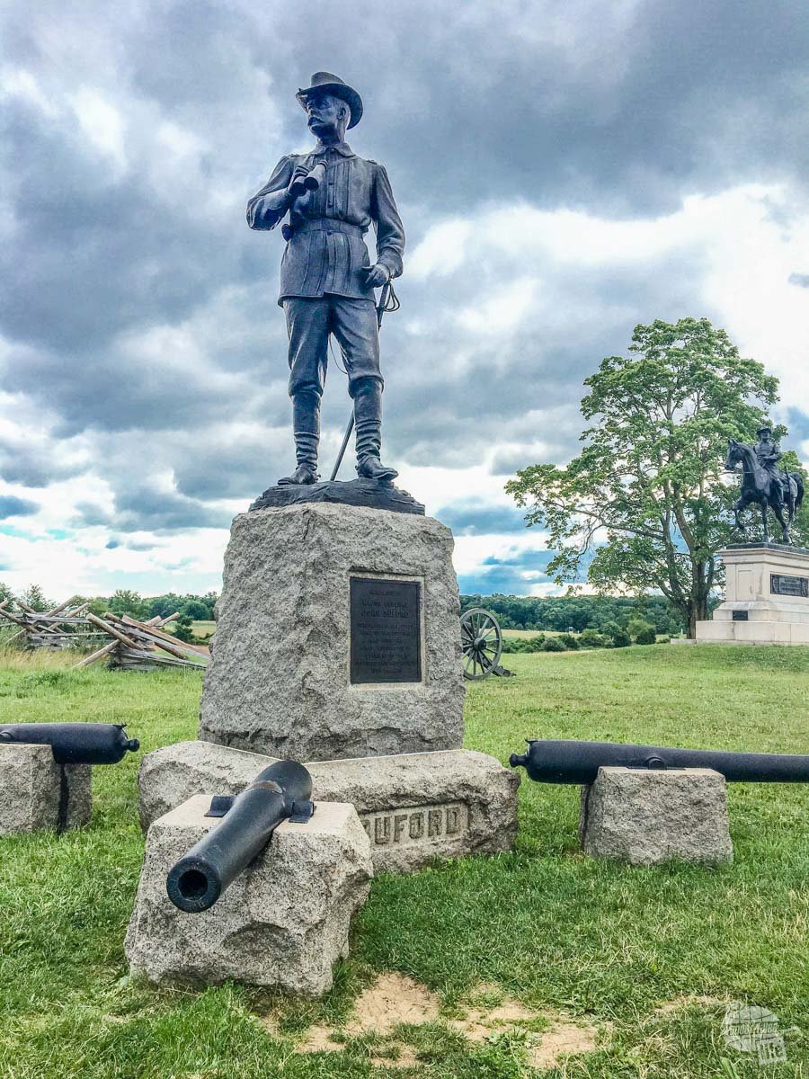 General Buford commanded the Union cavalry at Gettysburg. It was his decisive action to hold against a force three times his size which allowed time for Union troops to occupy the high ground around Gettysburg. The cannon in the foreground fired the first shot of the battle.