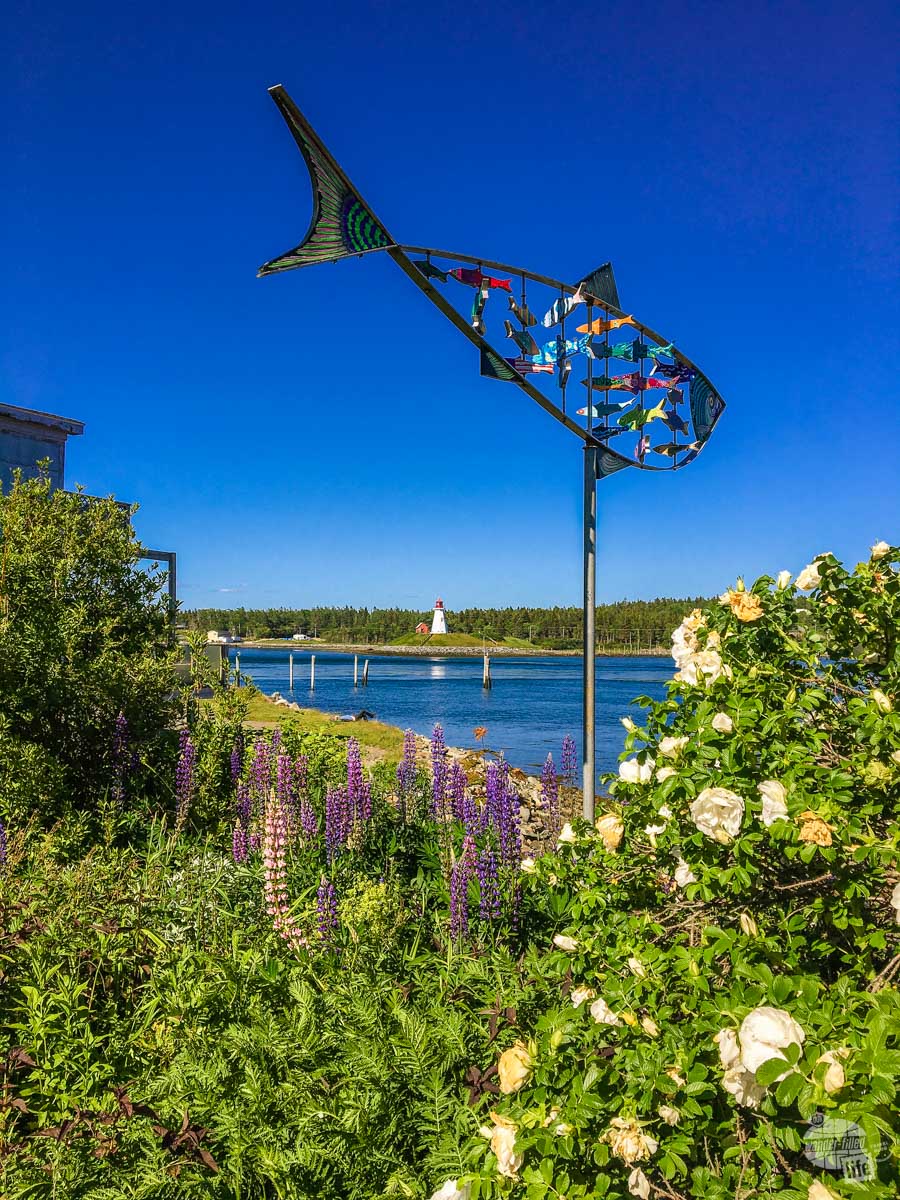 Street are in Lubec with the Mullholland Point Light (in Canada) in the distance.