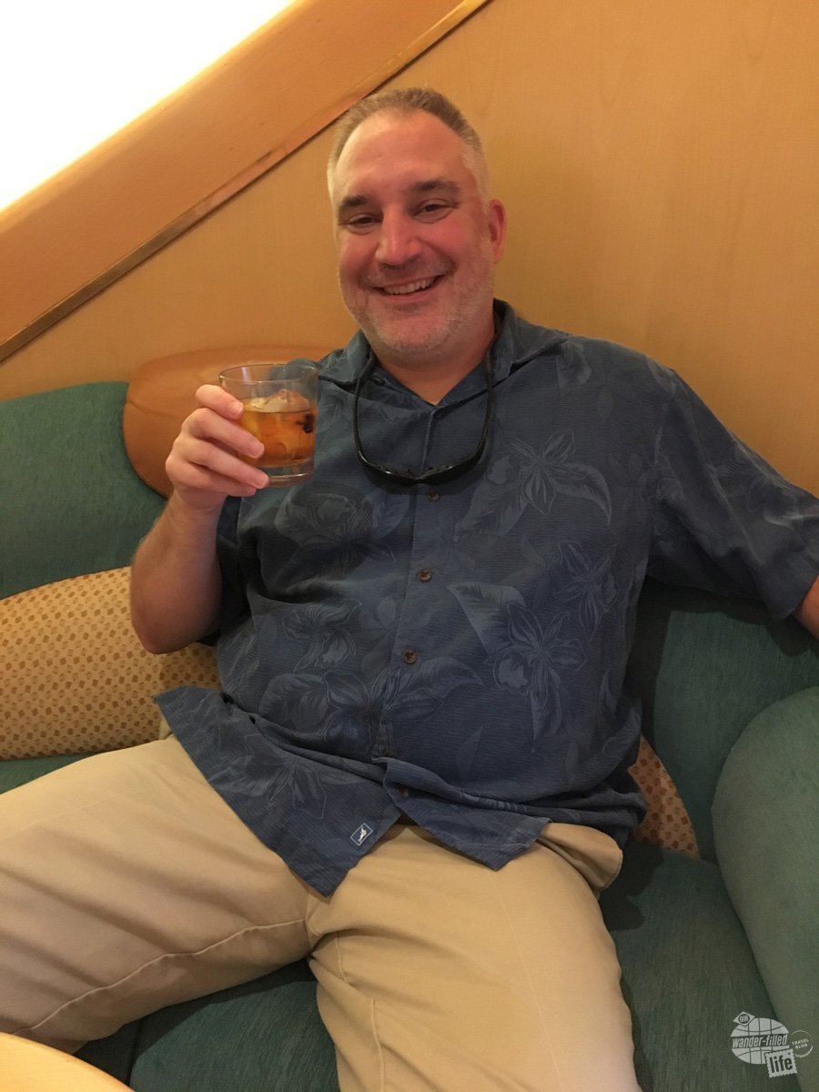 Grant enjoys unlimited drinks as one of the pros of cruising.