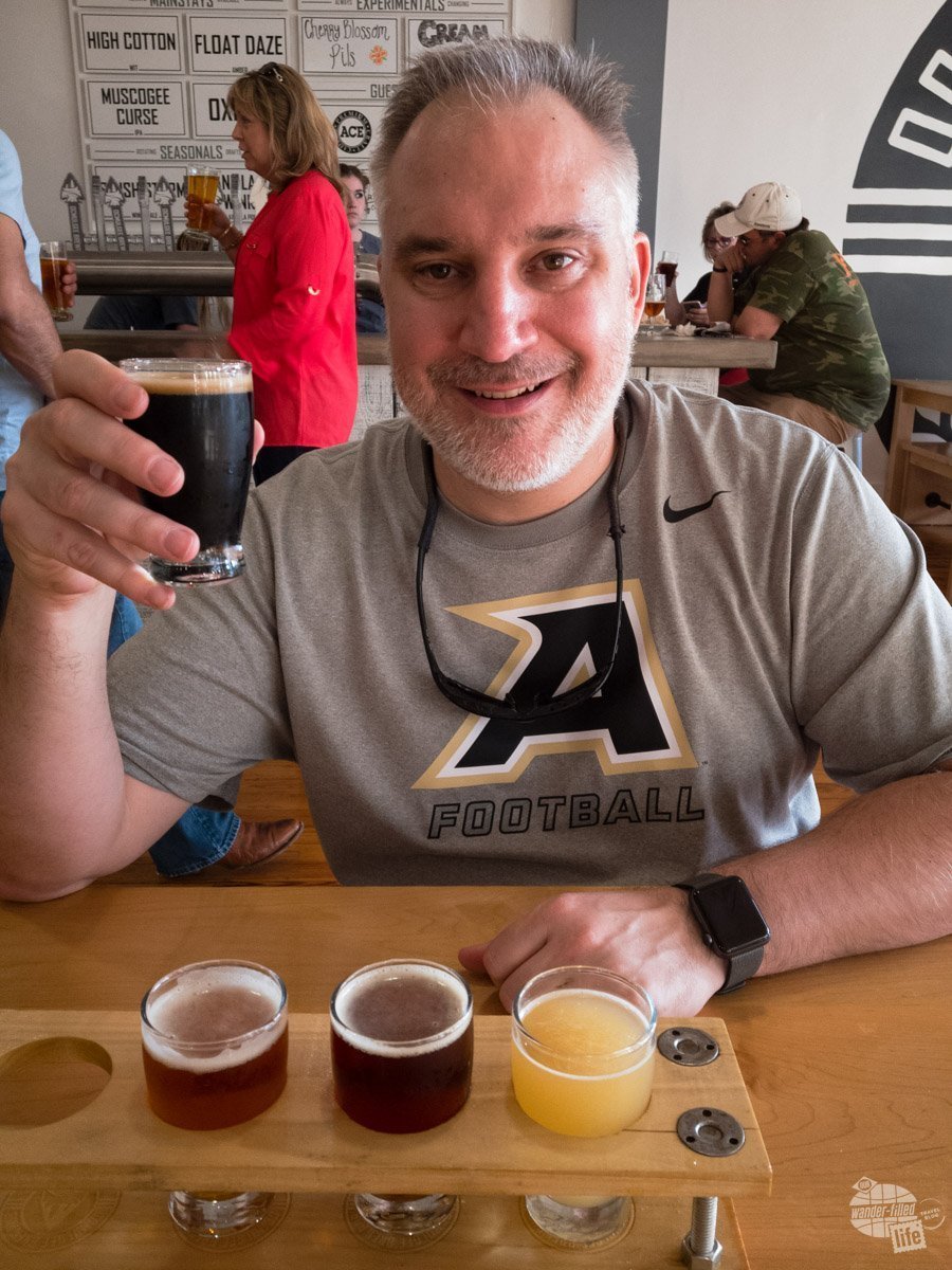 When at a new brewpub, like the Ocmulgee Brewpub in Macon, the first thing Grant does is sample a flight of the house brews.