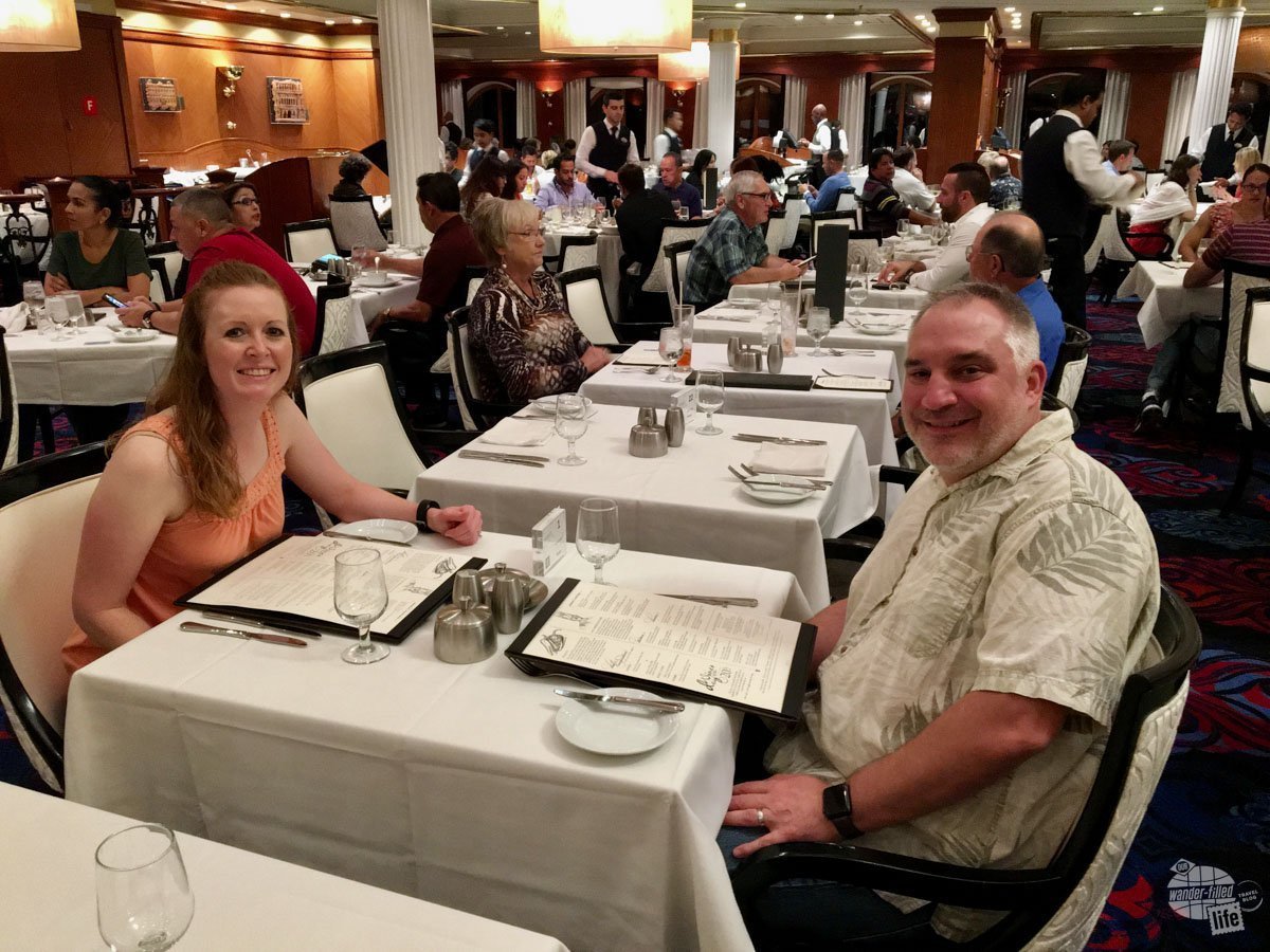Grant and Bonnie enjoying a meal in the main dining room on Royal Caribbean's Adventure of the Seas. Nearly unlimited food is a big pro of cruising.