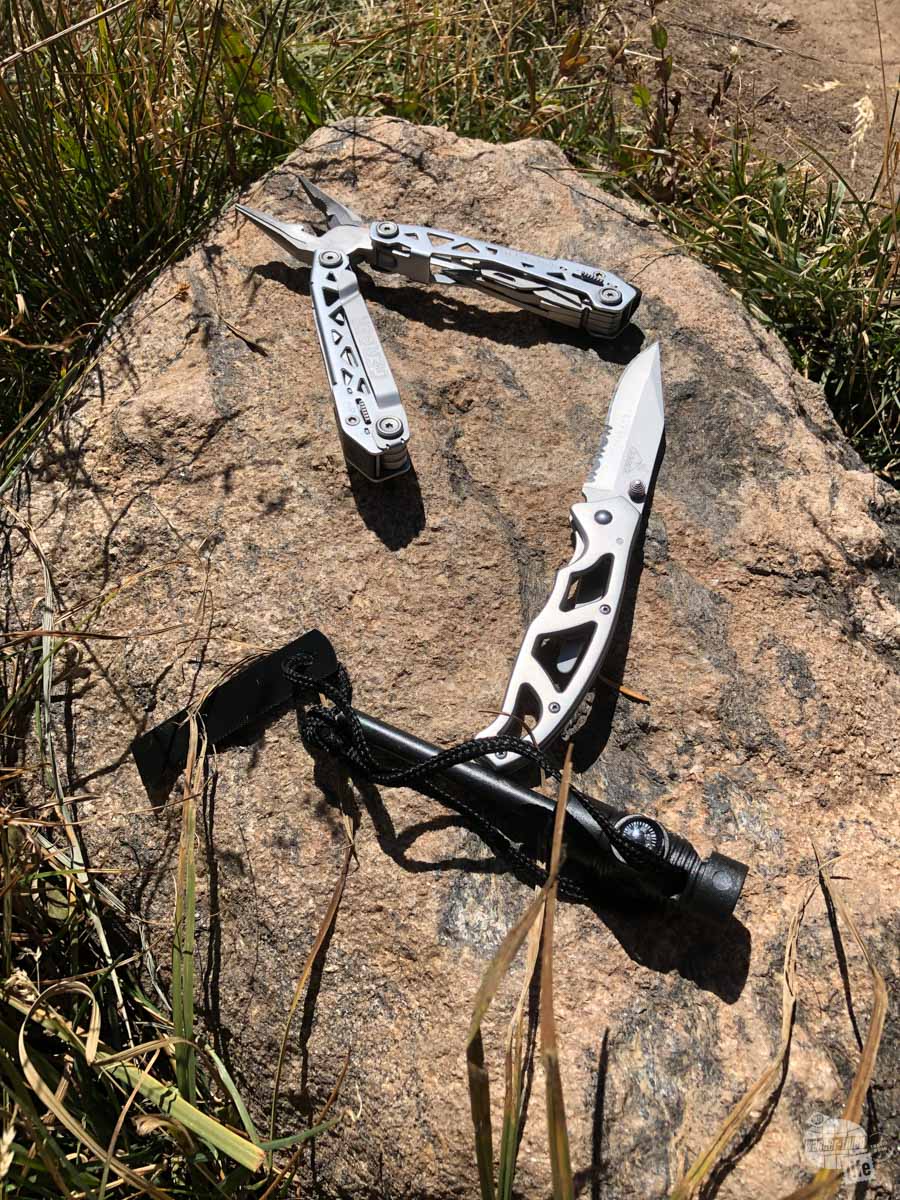 These are the tools I keep with me when I hike: A Gerber Multitool and a Xplore Gear firestarter rod in my pack and a Gerber Paraframe knife in my pocket.