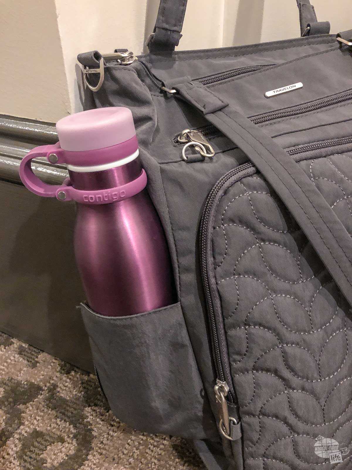 The water bottle pocket and locking zippers are two reasons why Bonnie loves the Travelon Quilted Anit-Theft Tote.