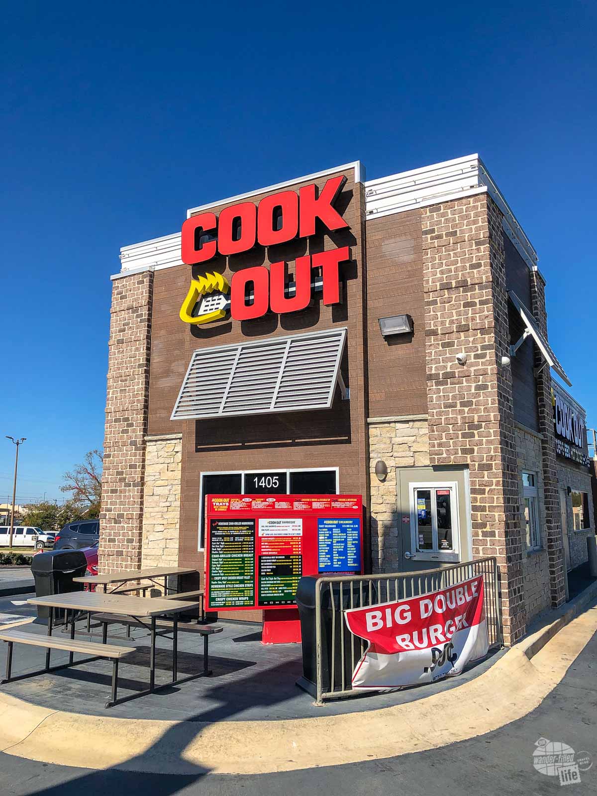 The front of a Cook Out restaurant.