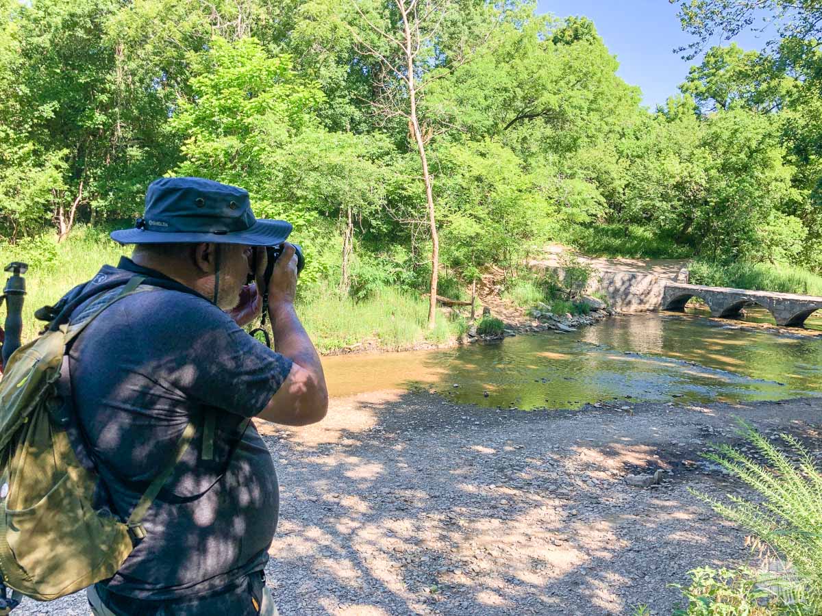 Grant taking a picture with his new camera at Travertine Creek.