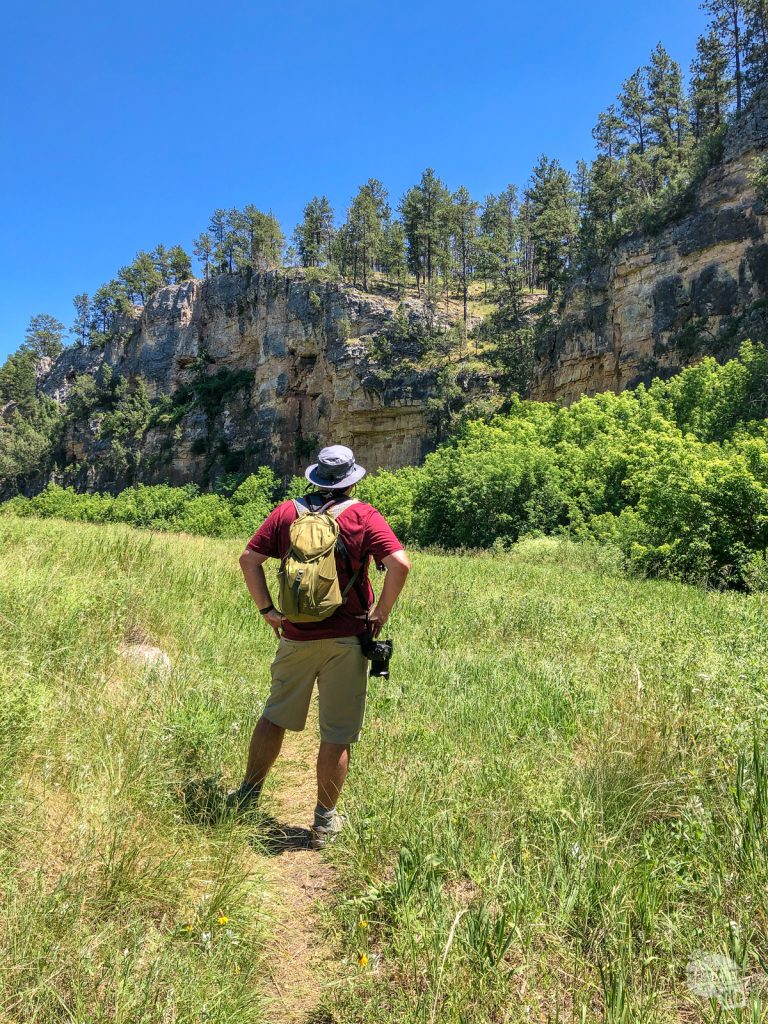 Grant stopping on the Cold Brook Canyon Trail in Wind Cave National Park to admire the canyon walls.