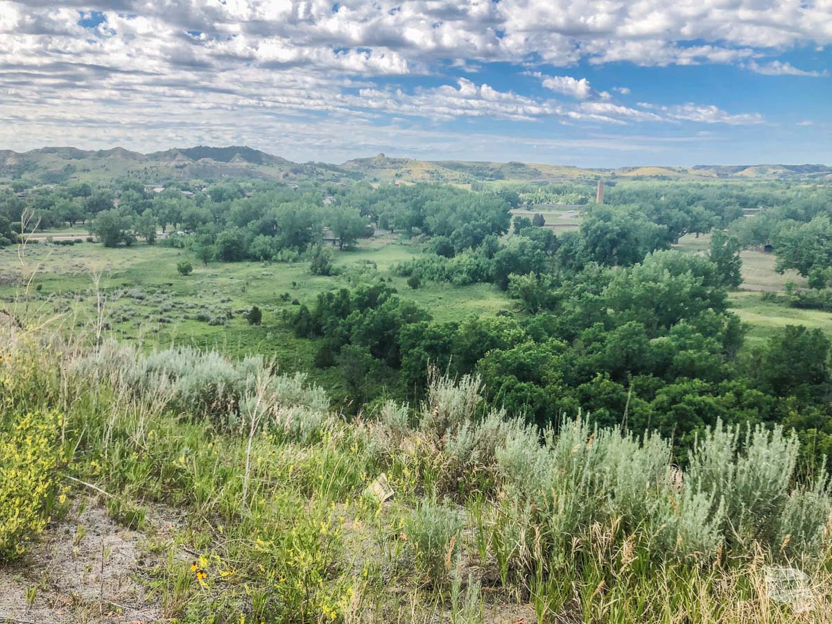 The view from the Medora Overlook. The chimney was the old meat processing plant.