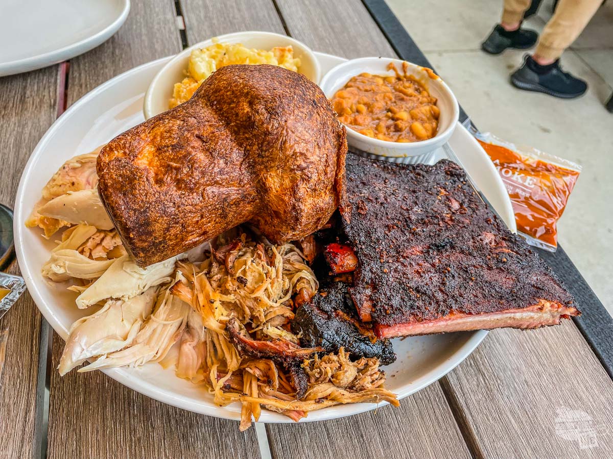 A BBQ plate with chicken, pork, brisket and ribs from Salt and Smoke
